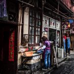 Cooking in the street - Leslie Rolland